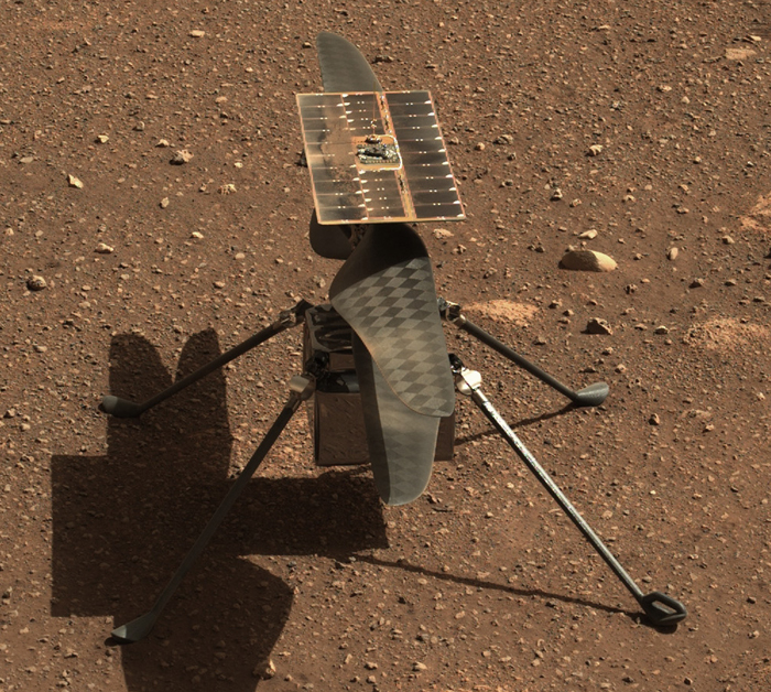 A photograph of the helicopter Ingenuity on the surface of Mars.