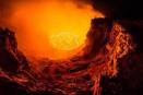 Staring over the mouth of an oozing volcanic pit