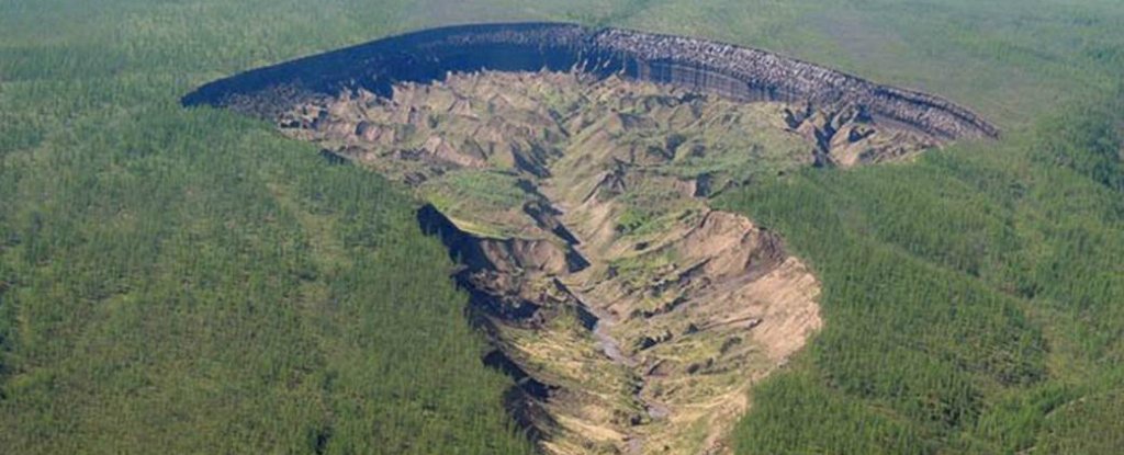 There's a 'Doorway to The Underworld' in Siberia So Big It's Uncovered Ancient Forests