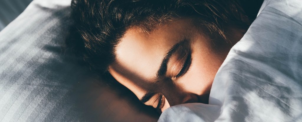 Woman Sleeping Under Doona