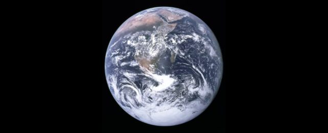 The Blue Marble image of Earth captured by NASA, on a black background.