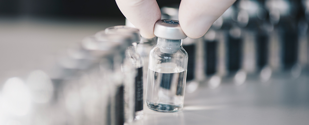 clear liquid in a medicine vial