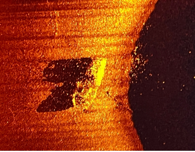 A sonar image of the shop Quest, shown as an object on an orangey background