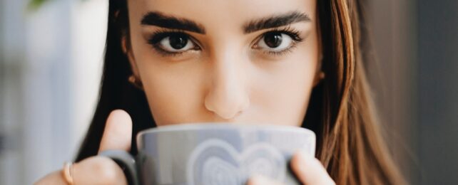 woman drinks coffee