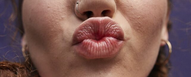 The Primal Origins of Kissing Were Just Revealed, And It's So Gross