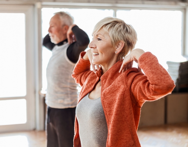 Older couple doing some stretches