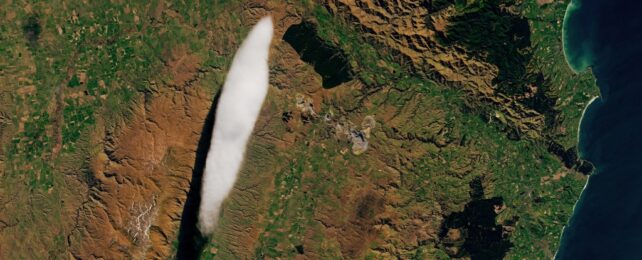 A long dense cloud above terrain