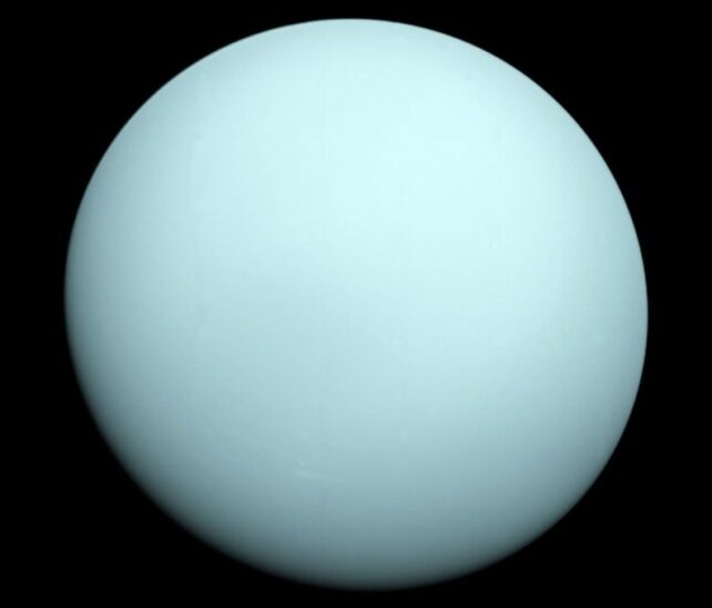 Pale, smooth blue sphere in space