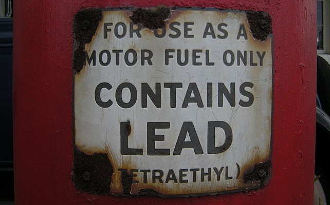 sign warning of lead in fuel