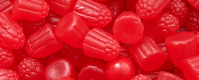 Bright red raspberry shaped lollies