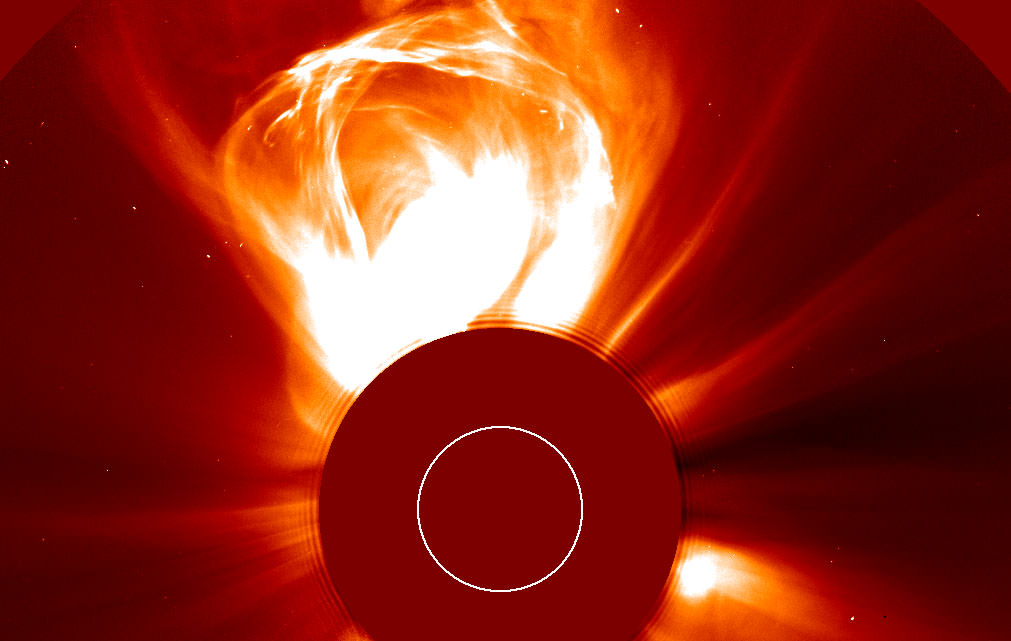 Image showing massive flare from sun with sun blocked out