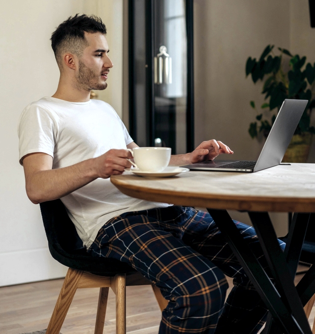 Man Sitting At Table