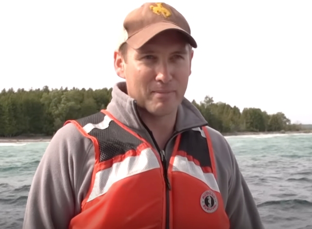 researcher on boat