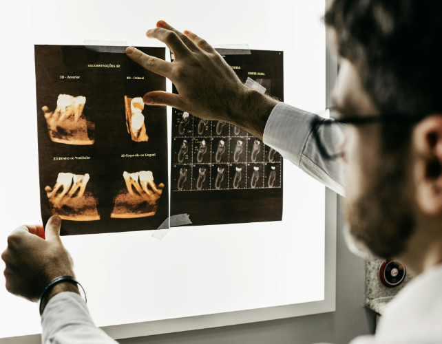 dentist checking x rays