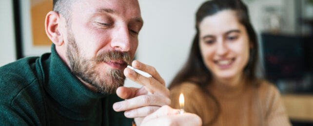 man smoking cannabis