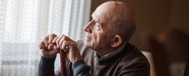 old man near a window