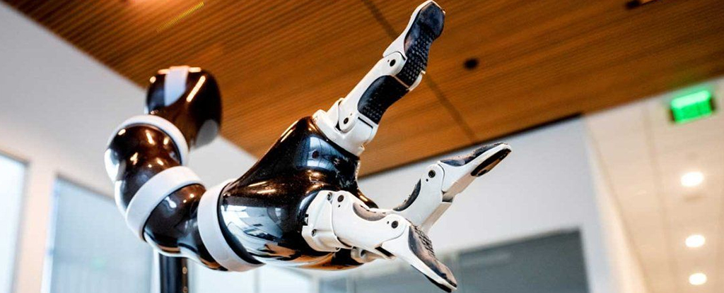 Paralyzed Man Controls a Robotic Arm With The Power of His Mind