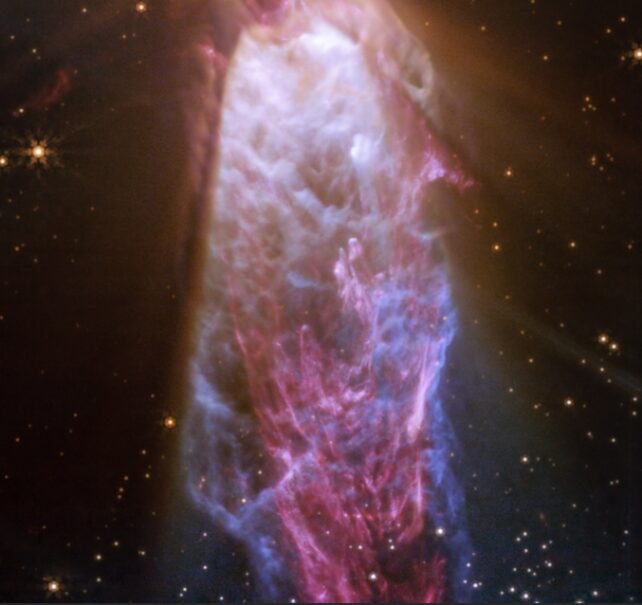 Incredible Image Reveals a Cosmic Hourglass Shimmering in Space