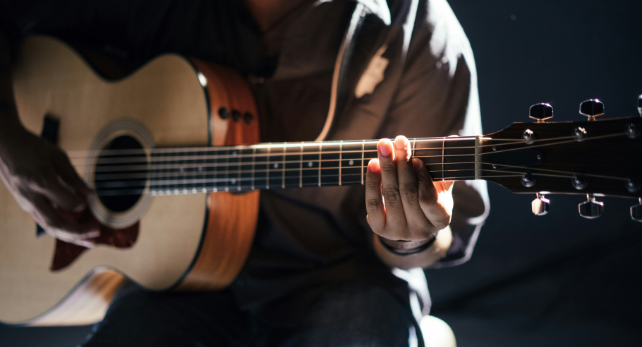 man playing guitar