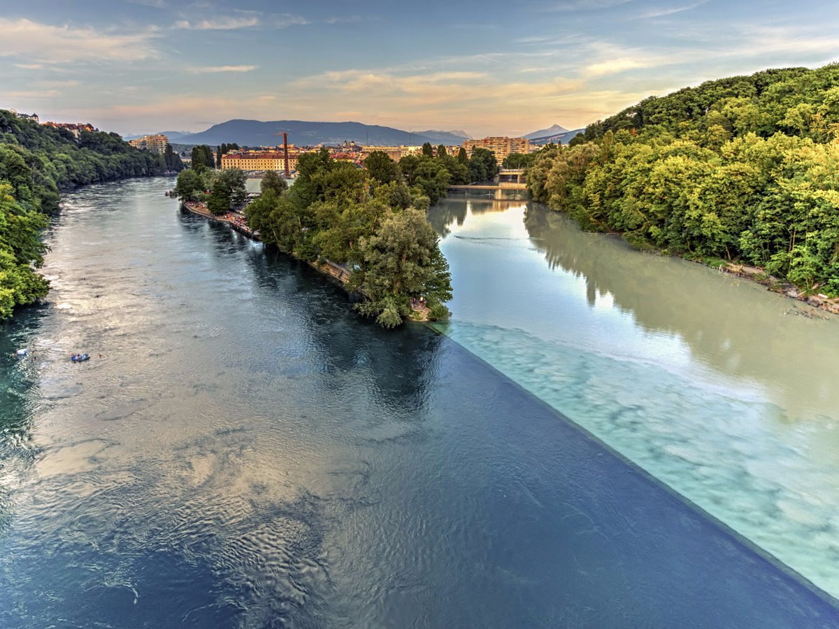 in-geneva-travelers-can-witness-the-majestic-sight-of-two-rivers-colliding-with-one-another-the-rhone-river-starts-in-lake-lehman-while-the-arve-river-is-fed-by-glaciers-in-the-chamonix-valley-when-the-two-bleed-into-one-another-it-makes-fo